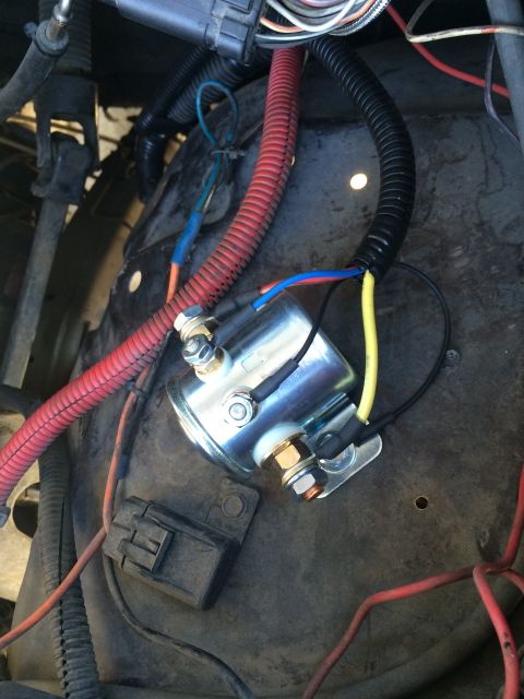 1997 Dodge 3500 - Close-up of a vehicle's starter solenoid and associated wiring harness.