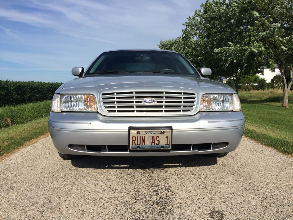 Silver Ford Crown Victoria front view with Illinois license plate RUN AS 1