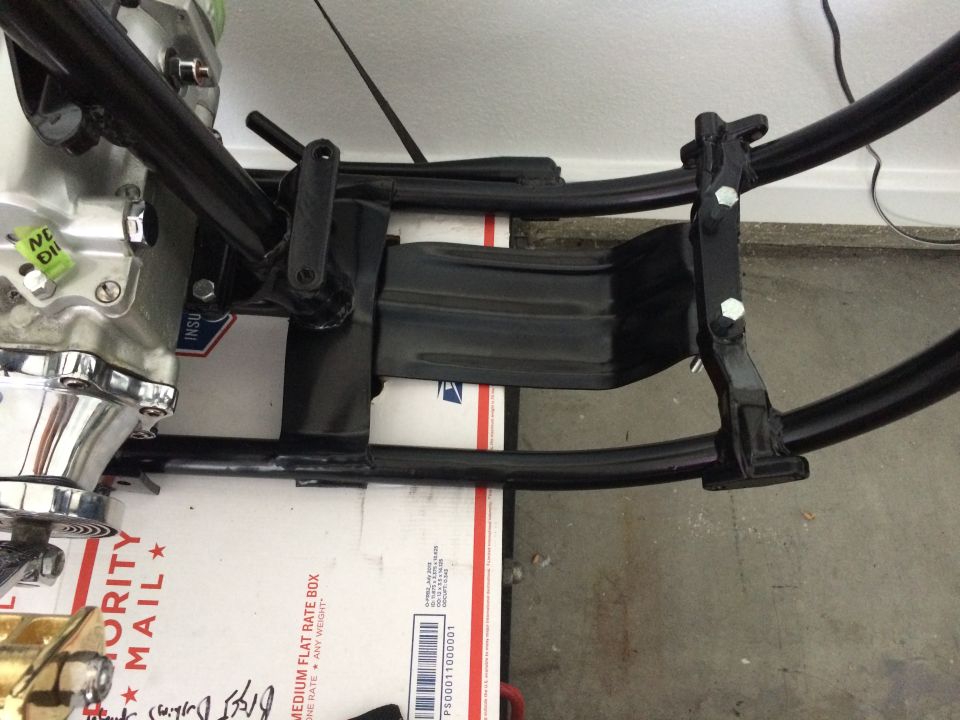 Motorcycle frame assembly attached to engine component