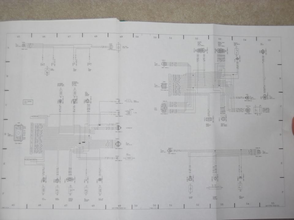 Wiring diagram with many lines and boxes, some text labels