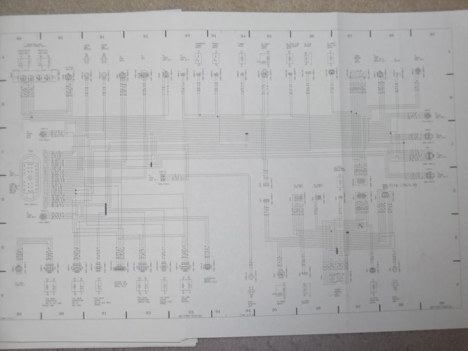 Fold-out factory wiring diagram spread, grid sections 89-99, with connectors, relays and switches