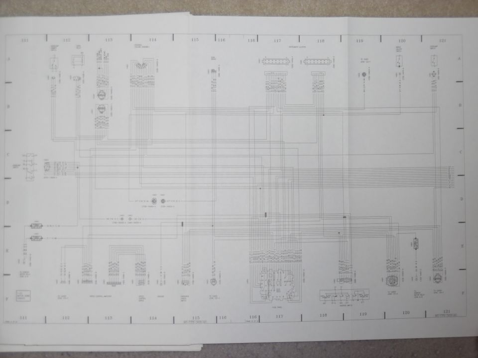 Fold-out factory wiring diagram spread, grid sections 111-121, with multi-pin connectors and harness runs