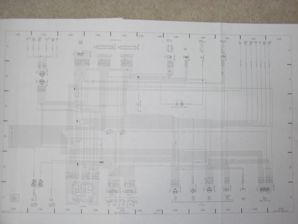 Fold-out factory wiring diagram spread, grid sections 133-143, with connectors and harness runs