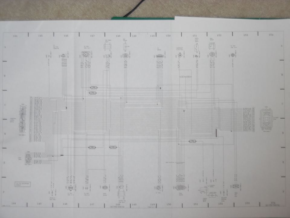 Fold-out factory wiring diagram spread, grid sections 144-154, with large multi-pin connectors