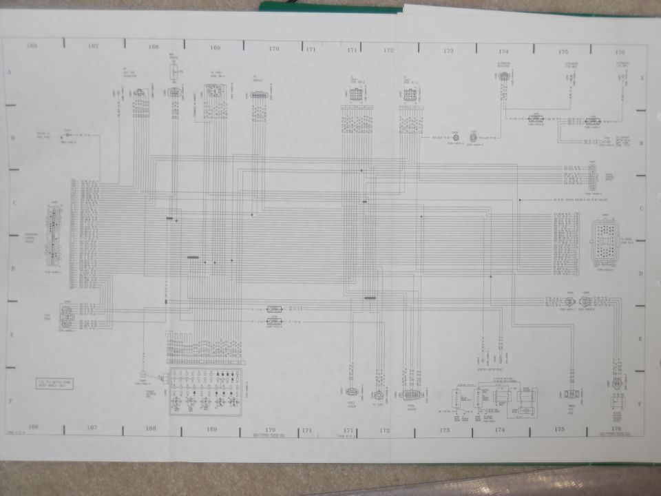 Fold-out factory wiring diagram spread, grid sections 166-176, with fuse block and connector circuits