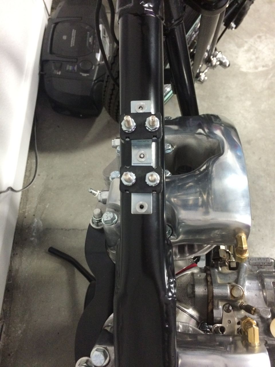 Motorcycle frame and chrome engine part
