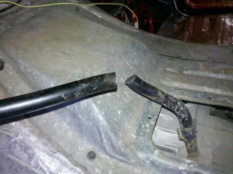1982 Ford Bronco - A broken metal tube is visible inside the vehicle's interior, suggesting a need for repair.