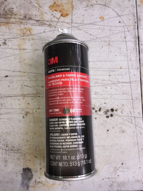 1993 Ford Bronco - A can of 3M Auto Advanced Headliner & Fabric Adhesive is shown against a textured, dirty surface.