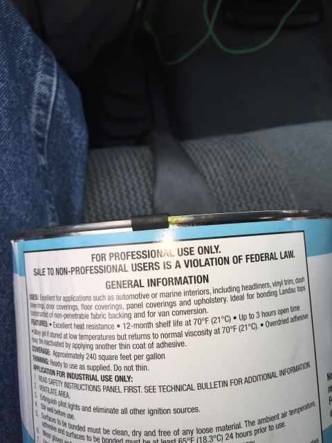 1993 Ford Bronco - A close-up view of a can of adhesive with instructions and warnings printed on the label. The text indicates it is for professional use onl…