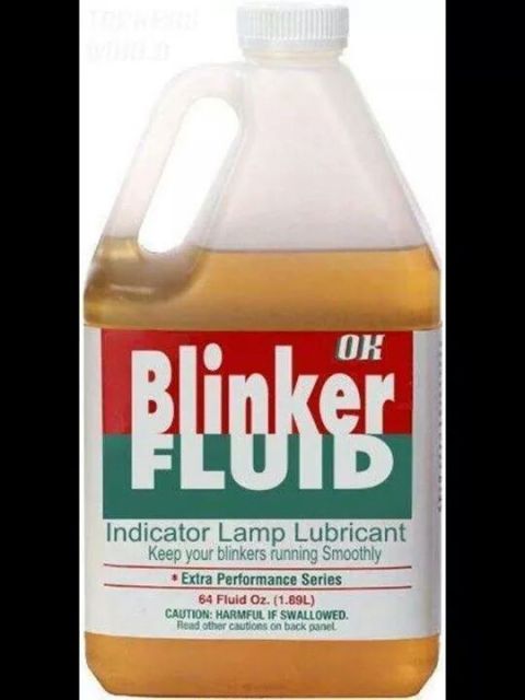 1993 Ford Bronco - A bottle of "Blinker Fluid" is shown. The label reads "Indicator Lamp Lubricant" and "Keep your blinkers running Smoothly".