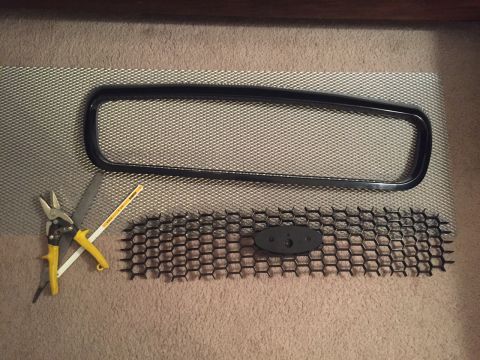 2007 Ford Crown Victoria - Cut out the honeycomb center of a Police Interceptor grille and sanded down the edges. Created a smooth straight back side for the mesh to…