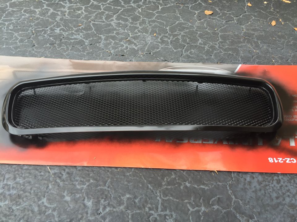 Black aftermarket diamond mesh front grille