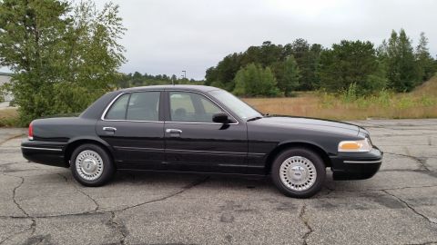 2001 Ford Crown Victoria - Side profile of a 2001 Ford Crown Victoria sedan.