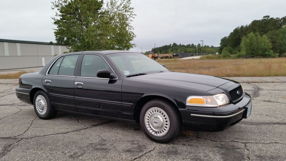 Black 2001 Ford Crown Victoria sedan, 3/4 front view