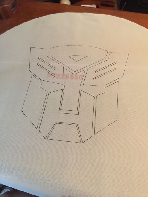 1993 Ford Bronco - Drawing of the Transformers Autobot logo on a piece of paper.