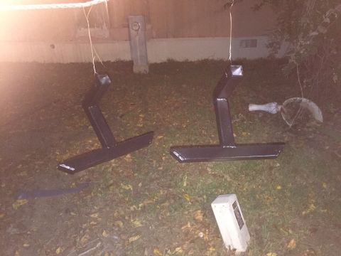 1993 Ford Bronco - Two sliders are hanging and drying outdoors. The "SUPERMOTORS" logo is visible in the lower right corner.