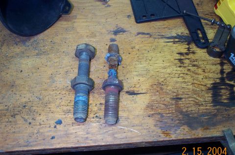 1986 Ford Bronco - New coil spring retainer bolt compared to old rusty broken one!