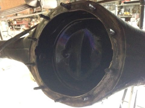 1979 Ford Bronco - Close-up rear view of a differential housing, likely from a 1979 Ford Bronco, showing the open differential case with several bolts around…