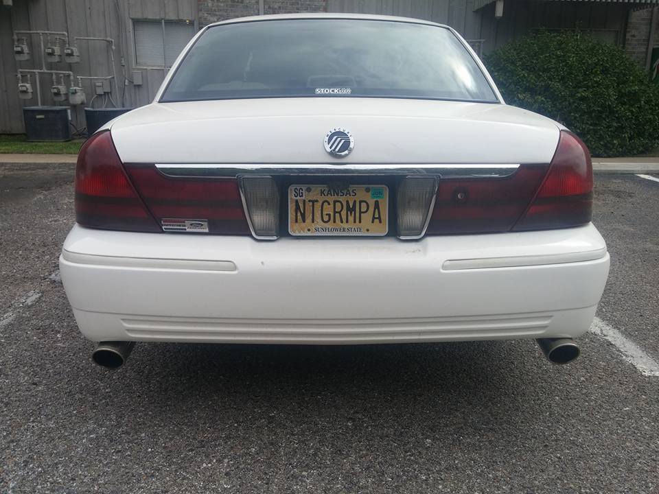 Rear view of a white Mercury sedan with Kansas plate