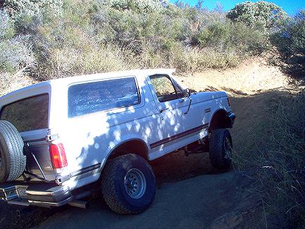 1988 Ford Bronco - This 1988 Ford Bronco navigates a off-road trail, its off-road capabilities.