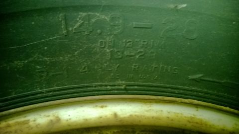 1959 Ford Pickup - Close-up of tire sidewall markings, including size and ply rating.