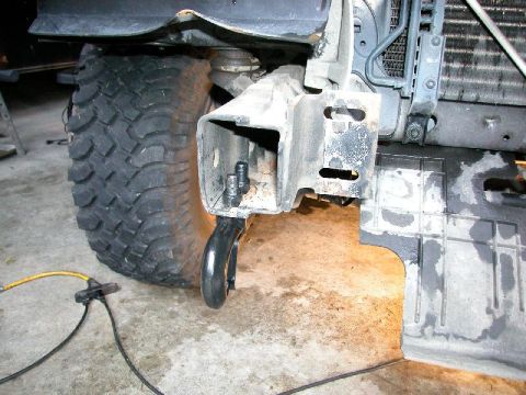 1995 Ford Bronco - Front recovery hook and tire detail.