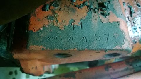 1959 Ford Pickup - Stamped numbers on a rusty metal component, possibly a part number.