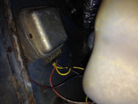 1973 Ford Bronco - This photo shows a voltage regulator with associated wiring, not a 1973 Ford Bronco.