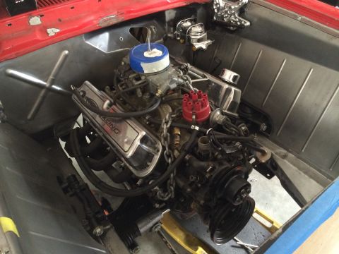 1964 Ford Fairlane - Engine bay view of a V8 motor with chrome valve covers and a blue air cleaner.
