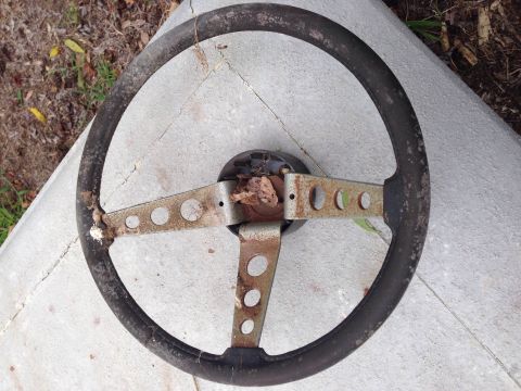 1979 Ford Bronco - This weathered steering wheel appears to be an aftermarket part, showing significant wear and rust.