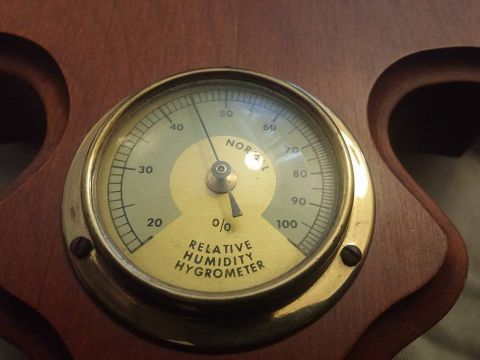 2000 Mercury Grand Marquis - This gauge measures relative humidity and is housed in a wooden frame.