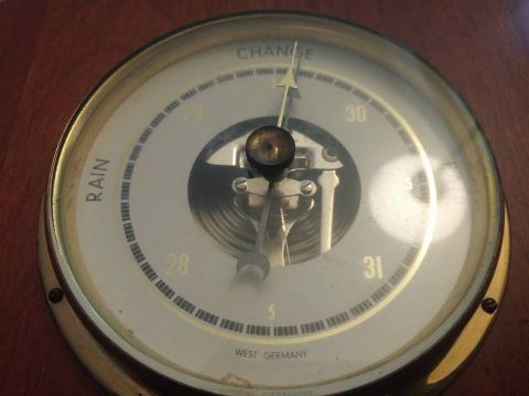 2000 Mercury Grand Marquis - Close-up of a barometer gauge made in West Germany, showing atmospheric pressure readings.