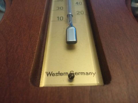 2000 Mercury Grand Marquis - A thermometer with a wooden casing and brass face displays temperature readings and the 'Western Germany' inscription.