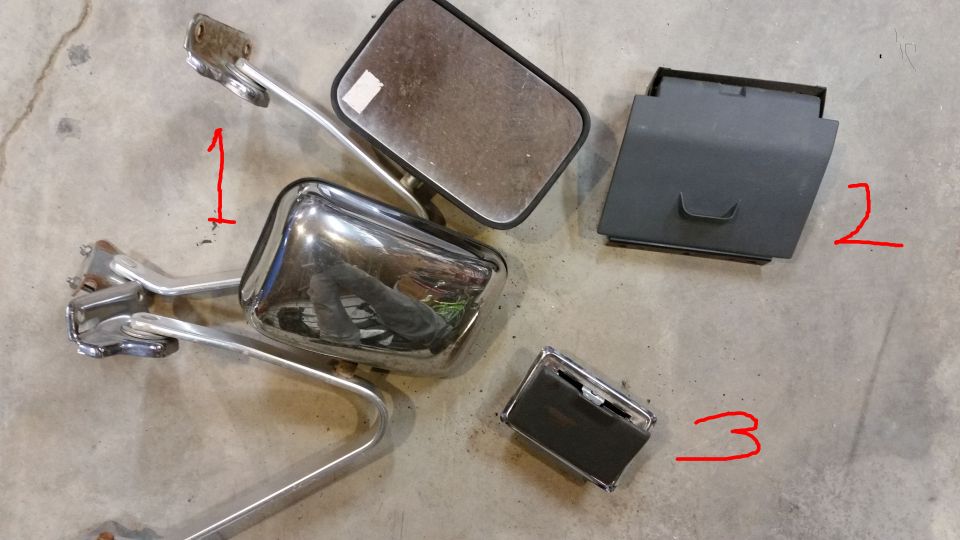 Two chrome side mirrors and two black interior parts labeled 1, 2, and 3