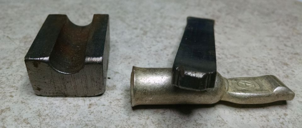 Electrical part with a metal block