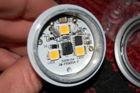 1994 Ford Bronco - Close-up of an LED circuit board, possibly from a Ryobi flashlight conversion, with visible components and date code.