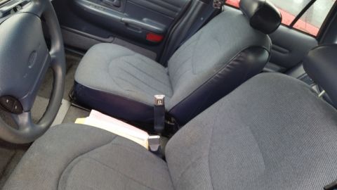 1991 Ford LTD Crown Victoria - Photo of a vehicle rear bench seat, not a technical document.