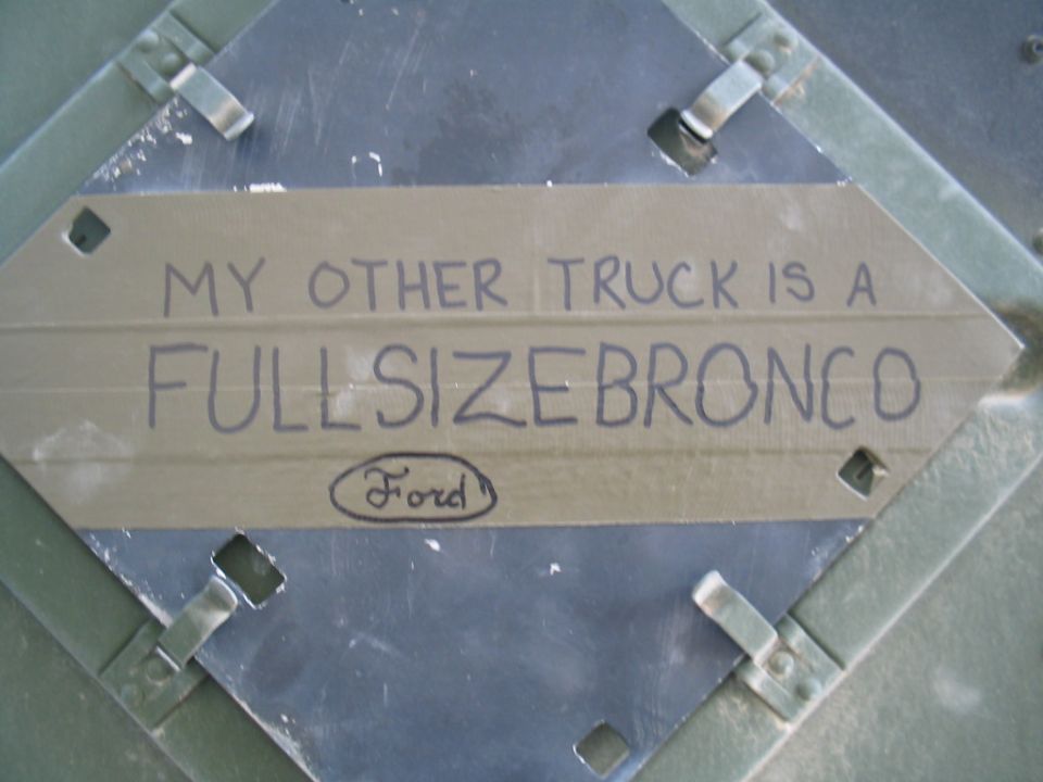Metal plate with "MY OTHER TRUCK IS A FULLSIZE BRONCO" and Ford logo