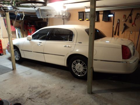 2004 Mercury Grand Marquis - This white sedan appears to be a 2003 model, not a 2004 Mercury Grand Marquis.