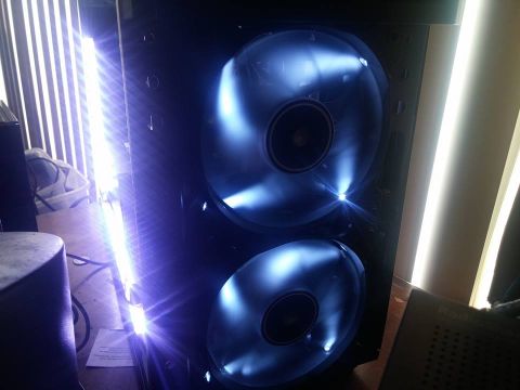 2000 Mercury Grand Marquis - Computer case interior with illuminated fans and LED lighting.