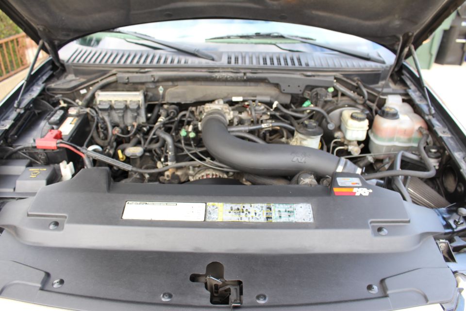 Black Ford Expedition engine bay with K&N intake.