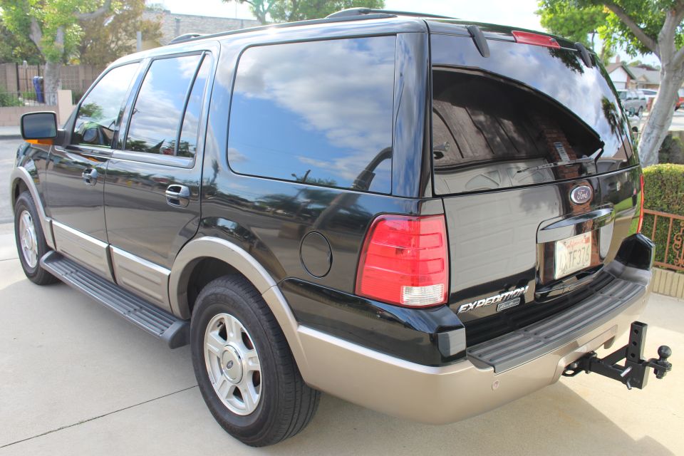 2003 Ford Expedition rear passenger side, black with tan trim, trailer hitch, CA plate 4XTF376