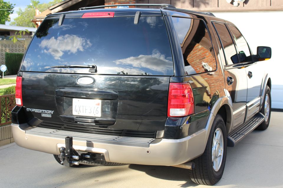 Black 2003 Ford Expedition rear view with California license plate 4XTF376