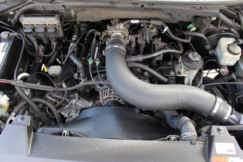2003 Ford Expedition engine bay showing K&N air intake system and engine components