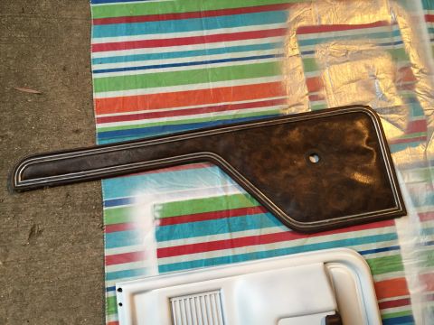 1978 Ford Bronco - Door panel trim piece with chrome accent, likely for an older vehicle.