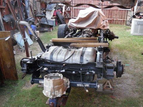 1993 Ford Bronco - I got tired of looking at the black spray-paint on the rims, so I pulled the Aluminum ones off for stripping.