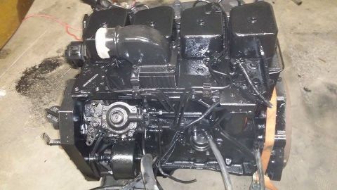 1994 Ford Bronco - Diesel engine with black paint, showing fuel injectors and intake manifold details.