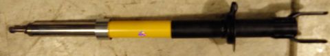 1993 Ford Thunderbird - A single shock absorber part is shown against a neutral background.