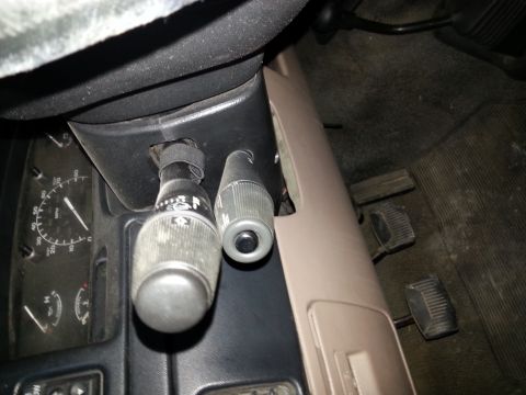 1994 Ford Bronco - Interior view of a 1994 Ford Bronco, showing the turn signal stalk and pedals.