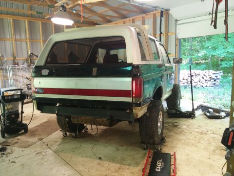 1989 Ford Bronco - This 1989 Ford Bronco is undergoing repairs in a garage setting.